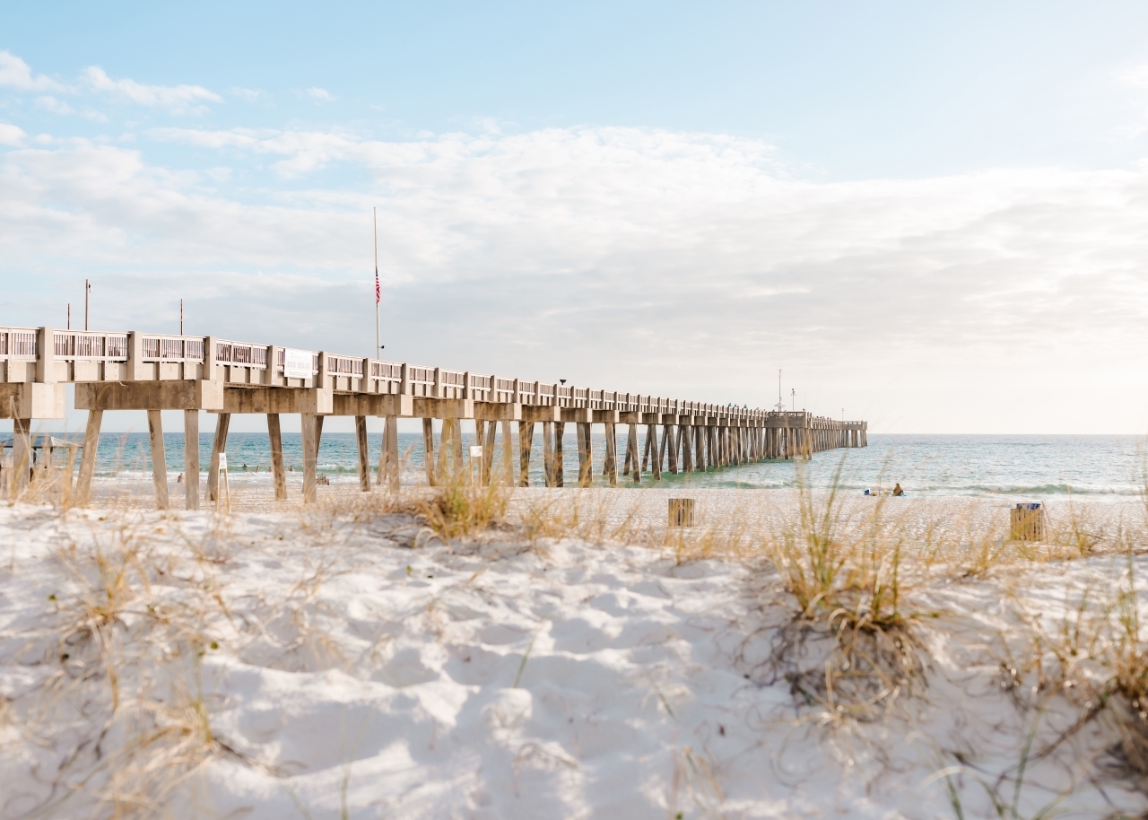 pier from the white beach in Panama City Beach, Florida